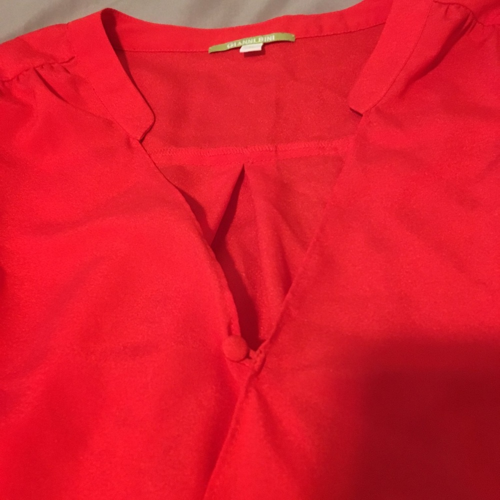 Red Silk Gianni Bini high low shirt.